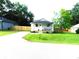 Charming single-story home with a welcoming front porch, freshly cut grass, and a new wooden fence at 109 W Poplar St, Stanley, NC 28164