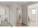 Hallway shows access to bedroom, bathroom and closet at 109 W Poplar St, Stanley, NC 28164