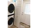 Convenient laundry area features a modern washer and dryer unit at 109 W Poplar St, Stanley, NC 28164