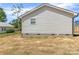 Shows the back of the property and part of the backyard at 109 W Poplar St, Stanley, NC 28164