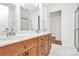 Bathroom with double sink, vanity, and shower/tub combination at 11539 Delores Ferguson Ln, Charlotte, NC 28277