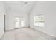 Bright, spacious bedroom with vaulted ceilings and private access to the back patio and natural light at 11539 Delores Ferguson Ln, Charlotte, NC 28277