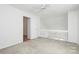 Bright bedroom features a ceiling fan, plush carpet, and abundant natural light at 11539 Delores Ferguson Ln, Charlotte, NC 28277