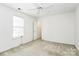 Bright bedroom features a ceiling fan, plush carpet, and a window at 11539 Delores Ferguson Ln, Charlotte, NC 28277
