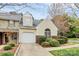Inviting townhome with attached garage, complemented by lush greenery and a cozy appeal at 11539 Delores Ferguson Ln, Charlotte, NC 28277