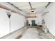 The garage features shelving and a clean concrete floor at 11539 Delores Ferguson Ln, Charlotte, NC 28277