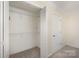 Walk-in closet with carpeted floor and wire shelving for easy storage at 1218 Green Oaks Ln # E, Charlotte, NC 28205