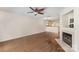 Bright living room with hardwood floors, fireplace, and open access to the kitchen at 1218 Green Oaks Ln # E, Charlotte, NC 28205
