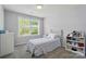 Bedroom with a window, carpet, and basic furniture at 12531 Morning Creek Ln, Charlotte, NC 28214