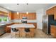 Open kitchen with an island, stainless steel appliances, and plenty of counter space at 12531 Morning Creek Ln, Charlotte, NC 28214