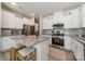 Beautiful kitchen with a central island, stainless steel appliances, and ample cabinet space at 127 Slip Shot Ln, Troutman, NC 28166