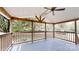 Covered back porch with views of the back yard and green space at 1274 Oakbrook Ln, Denver, NC 28037