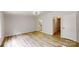 A spacious bedroom that leads to an ensuite bathroom and walk-in closet at 1274 Oakbrook Ln, Denver, NC 28037