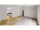 Spacious bedroom with light wood flooring, natural light and access to bath area at 1274 Oakbrook Ln, Denver, NC 28037