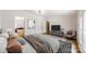 Tastefully decorated bedroom featuring hardwood floors and ensuite bathroom at 1274 Oakbrook Ln, Denver, NC 28037
