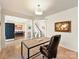 Versatile office space with a dark accent wall, offering a comfortable workspace with an open concept feel at 135 Coronilla Rd, Mooresville, NC 28117