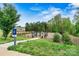 Community dog park with separate enclosures and seating areas at 1617 Post Ct, Gastonia, NC 28054
