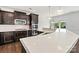Close up of the kitchen's quartz countertop and stainless steel appliances at 1617 Post Ct, Gastonia, NC 28054