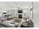 Comfortable living room with fireplace, tv, modern decor, and access to the kitchen at 1617 Post Ct, Gastonia, NC 28054
