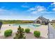 Community pool with comfortable lounge area and a pool house; lush landscaping at 1617 Post Ct, Gastonia, NC 28054