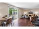 Open living space with a dining table and access to a private balcony at 1620#F Arlyn Cir, Charlotte, NC 28213