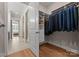 Organized walk-in closet with custom shelving, drawers, and hanging rods, providing ample storage at 17728 Jetton Green Loop, Cornelius, NC 28031