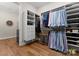 Walk-in closet with custom shelving, drawers, and hanging space providing ample storage at 17728 Jetton Green Loop, Cornelius, NC 28031