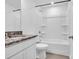 Bathroom featuring granite counters, white cabinets and tub with shower at 1834 Teachers House Nw Rd, Concord, NC 28027