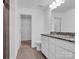 Bathroom featuring granite counters, white cabinets and tile flooring at 1834 Teachers House Nw Rd, Concord, NC 28027
