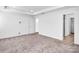 Spacious bedroom with neutral carpet, recessed lighting, and a walk-in closet at 1834 Teachers House Nw Rd, Concord, NC 28027