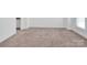 Bright, neutral bedroom with soft carpeting and window, ready for personalization at 1834 Teachers House Nw Rd, Concord, NC 28027