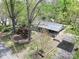 Charming home featuring mature trees, a garden, and a covered parking area at 2106 4Th Ne St, Hickory, NC 28601