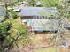Home featuring a covered porch and large windows for natural light at 2106 4Th Ne St, Hickory, NC 28601