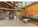 Unfinished basement offering ample space, exposed utilities, large windows, and a spiral staircase leading to upper level at 2106 4Th Ne St, Hickory, NC 28601