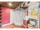 Compact basement bathroom with step-in shower, vessel sink, and unique black and white striped ceiling feature at 2106 4Th Ne St, Hickory, NC 28601