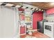 Small bathroom in the basement with a walk-in shower, a toilet, and washer and dryer hook-up at 2106 4Th Ne St, Hickory, NC 28601