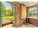Step from the yard into a well-lit studio space with views of the property and a blank canvas to create in at 2106 4Th Ne St, Hickory, NC 28601
