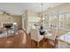 Open-concept eat-in kitchen and living room perfect for entertaining at 213 Walnut Point Dr, Matthews, NC 28105