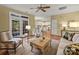 Inviting living room with hardwood floors, and seamlessly connected to the kitchen at 213 Walnut Point Dr, Matthews, NC 28105