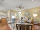Bright living room with hardwood floors, a fireplace, and an open layout at 213 Walnut Point Dr, Matthews, NC 28105