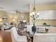 Inviting living room features a fireplace, a ceiling fan, and comfortable seating, perfect for relaxation and gatherings at 213 Walnut Point Dr, Matthews, NC 28105