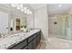 Beautiful bathroom featuring double sinks with granite counters and walk in shower at 2459 Glenridge Dr, Gastonia, NC 28054