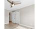 Bedroom with ceiling fan, closet and new floors at 2459 Glenridge Dr, Gastonia, NC 28054