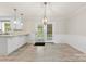 Dining area with backyard access, open to the kitchen, allowing seamless flow and entertaining at 2459 Glenridge Dr, Gastonia, NC 28054