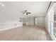 Expansive living room with neutral tones, offering seamless access to other home areas at 2459 Glenridge Dr, Gastonia, NC 28054
