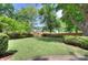 Backyard showing manicured lawn and garden at 2729 Clemson Ave, Charlotte, NC 28205