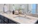 Bathroom vanity with stone countertop, dual sinks, and chrome faucets at 2729 Clemson Ave, Charlotte, NC 28205