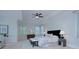 Bright bedroom with ceiling fan, windows, and a neutral color palette at 2729 Clemson Ave, Charlotte, NC 28205
