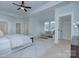 Airy bedroom featuring sitting area, tray ceiling, and abundant natural light at 2729 Clemson Ave, Charlotte, NC 28205