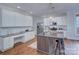 Well-appointed kitchen features stainless appliances, granite countertops, a central island, and ample cabinet space at 2729 Clemson Ave, Charlotte, NC 28205